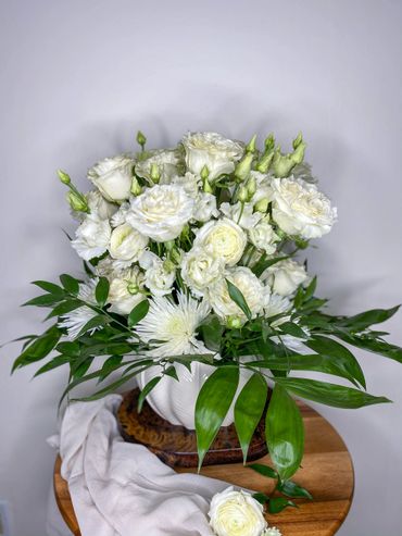 large white rose arrangement
