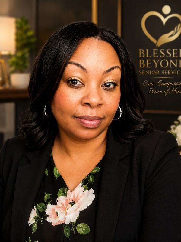 Confident woman in professional attire with floral blouse and hoop earrings.