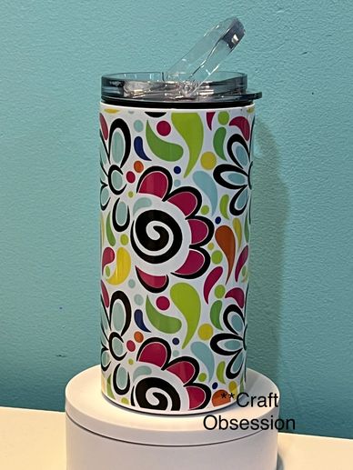 4 in 1 insulated Can Cooler.  Fun Floral Pattern.  Holds regular can, skinny can, bottle or comes wi