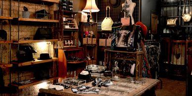 Interior of a rustic boutique showcasing jewelry and accessories.