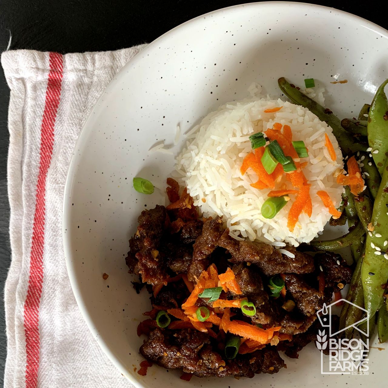 Ginger bison with rice and green beans