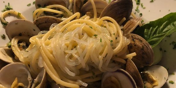 Spaghetti with clams and herbs.