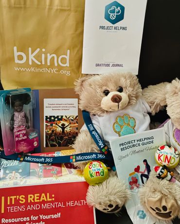 A teddy bear surrounded by mental health and kindness resources.