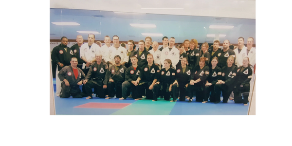 Class photo of graduating Black Belts