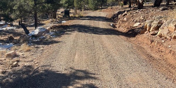 Finished driveway after new culvert installation and grading. 