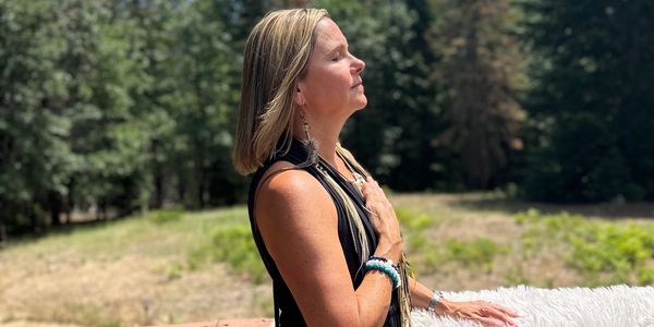 Woman taking breath on the forest