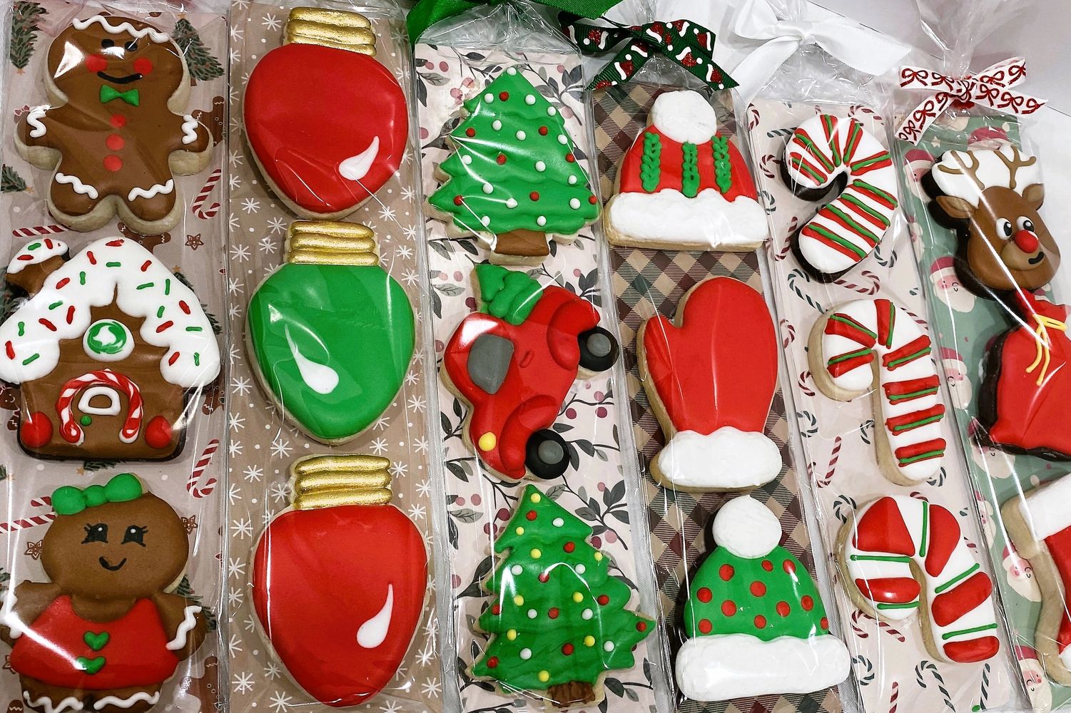 Cupcakes decorated as reindeer with pretzels, candy eyes, and red noses.