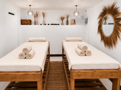 Couples massage area with two prepared treatment beds at Kitam Spa & Massage in Kendwa, Zanzibar.