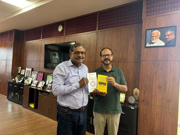 Presenting my book "The Right Lens" to Director IIM Sambalpur - Prof. Mahadeo Jaiswal