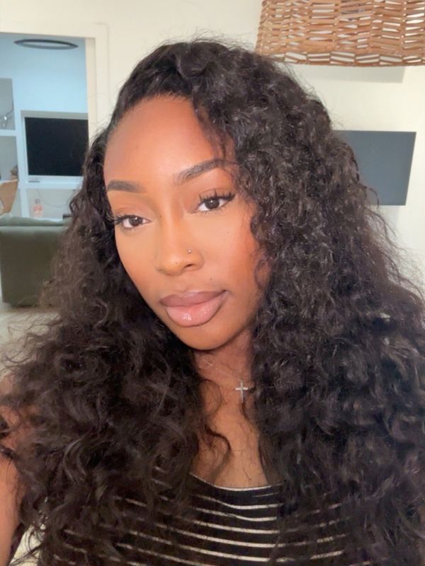 CEO wearing our luxury raw Indian curly bundles and our ultra thin HD 6X6 closure