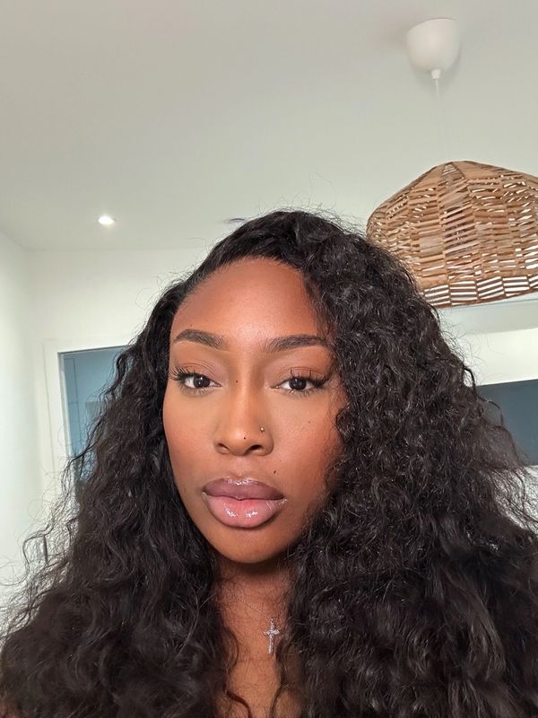 CEO wearing our luxury raw Indian curly bundles and our ultra thin HD 6X6 closure