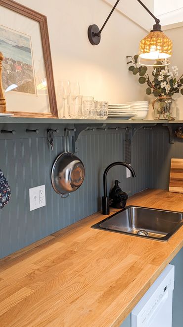 Nova scotia glamping dome with full kitchen butcher block counter top and farmhouse shelf