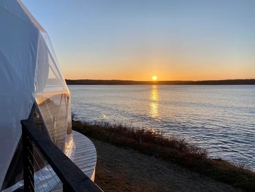 Nova scotia glamping dome with sunrise over the lahave islands