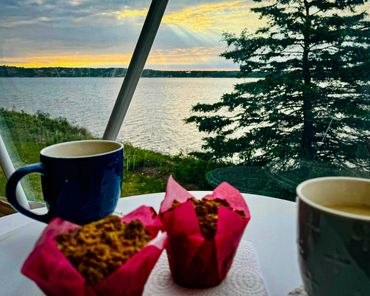 NS Dome showing ocean view and sunrise. muffins and coffee.