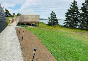 NS Dome with accessible pathway, lighting and ramp to private deck