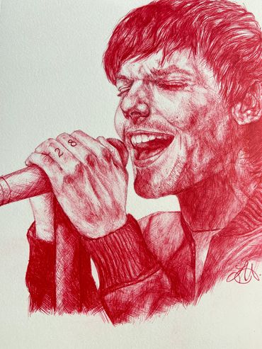 Red ink pen on white paper
