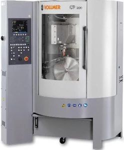 Industrial VOLLNER CNC machine with control panel.