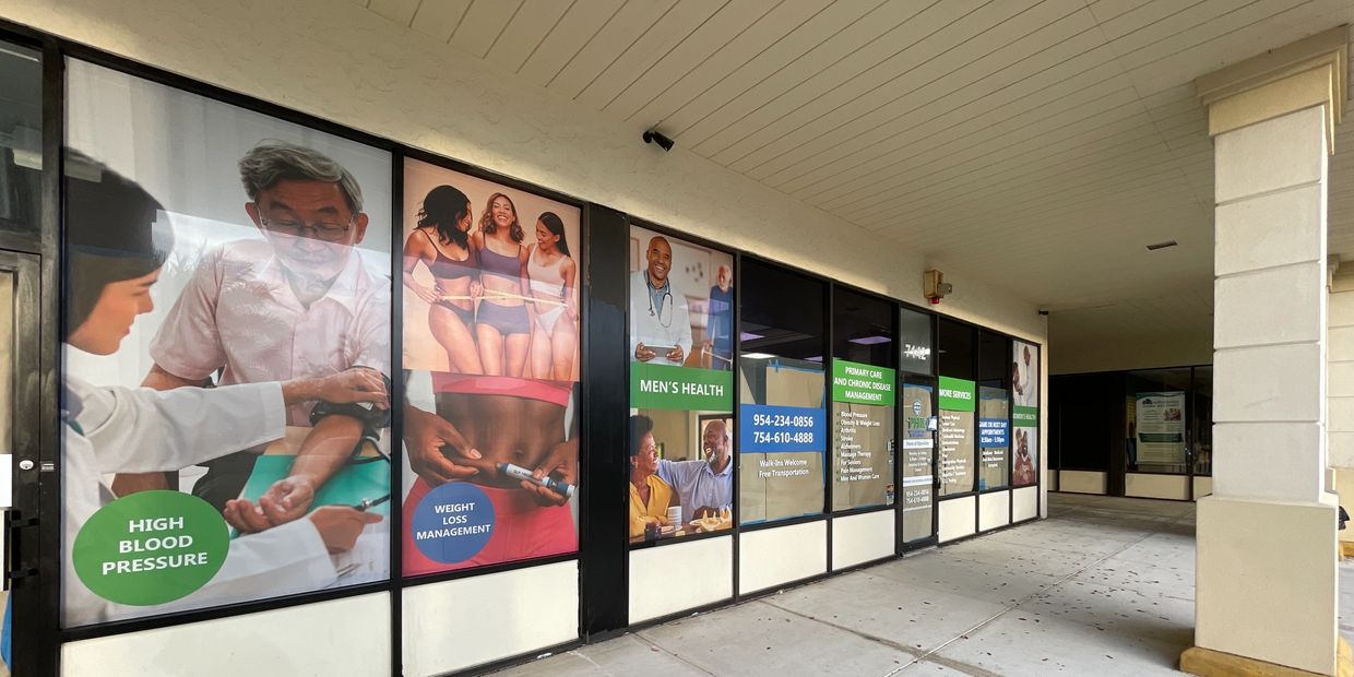 Clinic window displays health services and contact info.