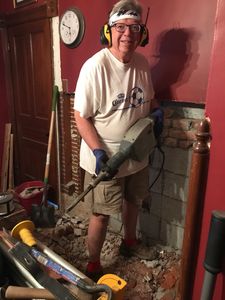 Demo Day! getting rid of an old brick hearth to make room for a new nook
