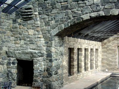 Indoor pool with fireplace