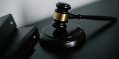 Gavel resting on a desk