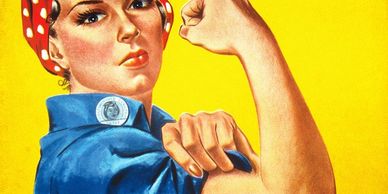 Iconic Rosie the Riveter flexing her arm in empowerment.