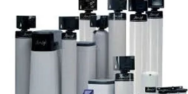 Various water softener tanks and control units grouped together.