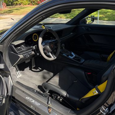 Deep interior cleaning and steam detailing of sports car cabin in Sherman Oaks
