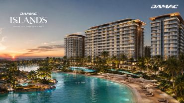 Luxury waterfront residential complex at sunset.