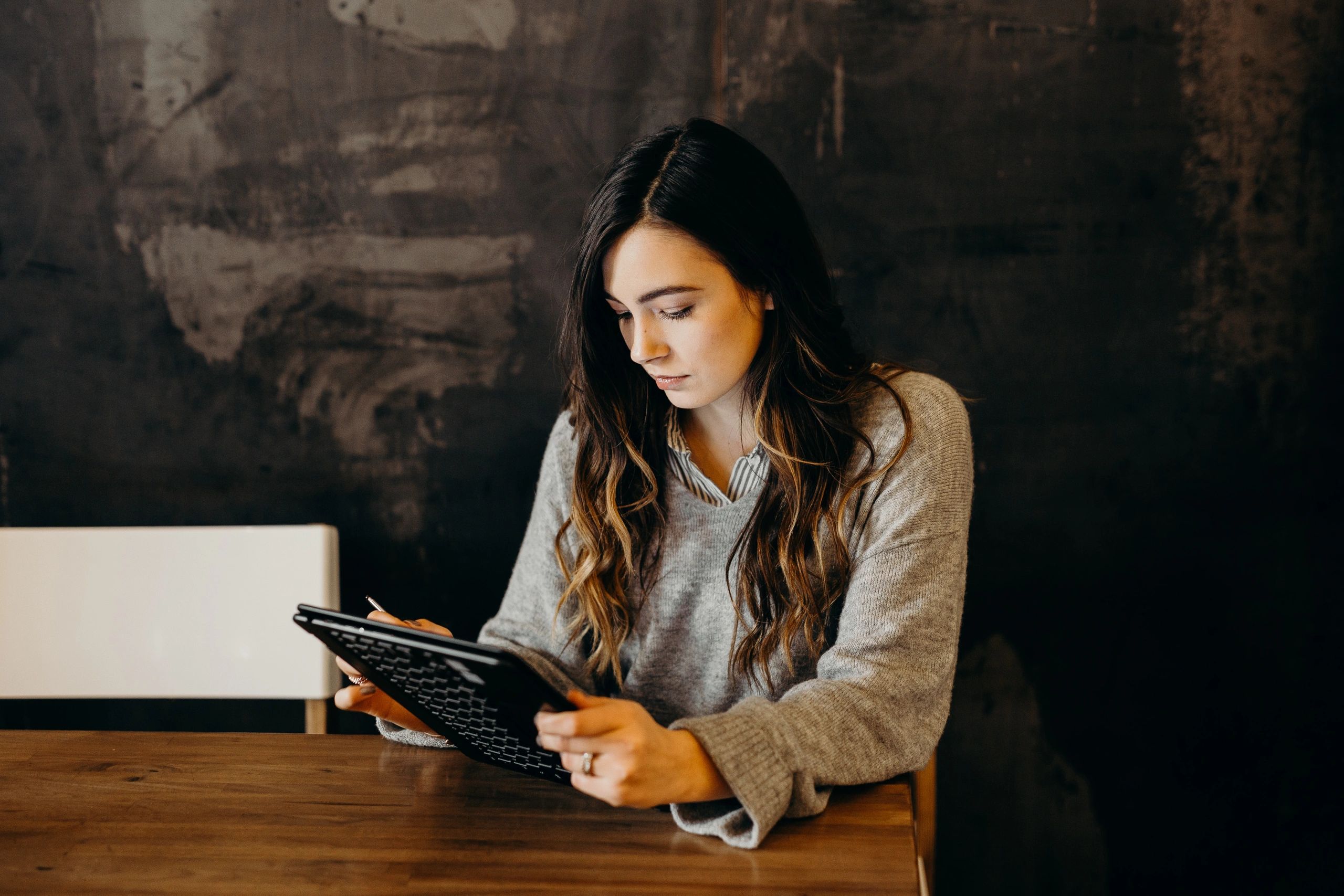 Woman working on her tablet