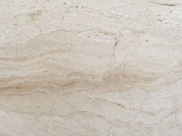 Natural beige marble with subtle veining and texture.