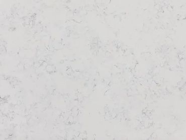 White marble surface with subtle grey veining.