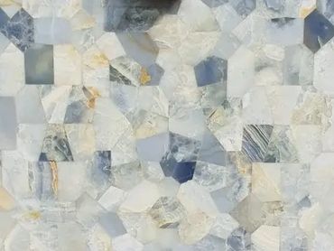 Abstract mosaic pattern with blue, gray, and beige tones.