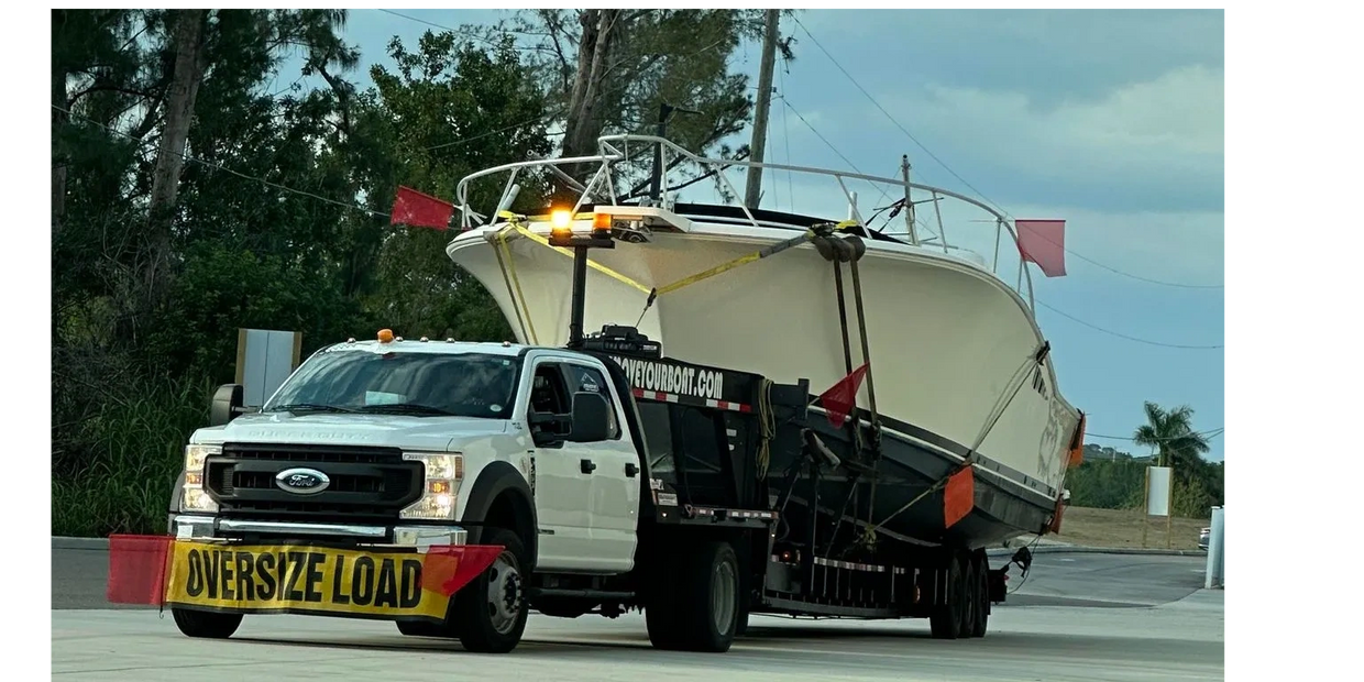 Boat being transported by Freight Company.