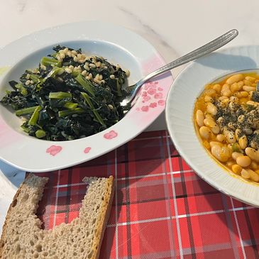 Plant based gut boosting dinner combination with cannellini bean stew, kale with pearl barley.