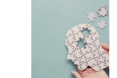 Picture of head shape, showing a jigsaw puzzle with some pieces not yet placed in picture.
