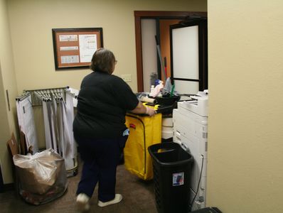 J & F Facility Services technician cleaning an office in Chippewa Falls Wisconsin. 