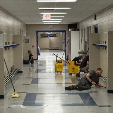 Projects crew cleaning floors at Blair-Taylor School District