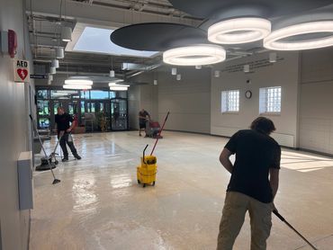 technicians polishing floors at CVTC Menomonie before the school year