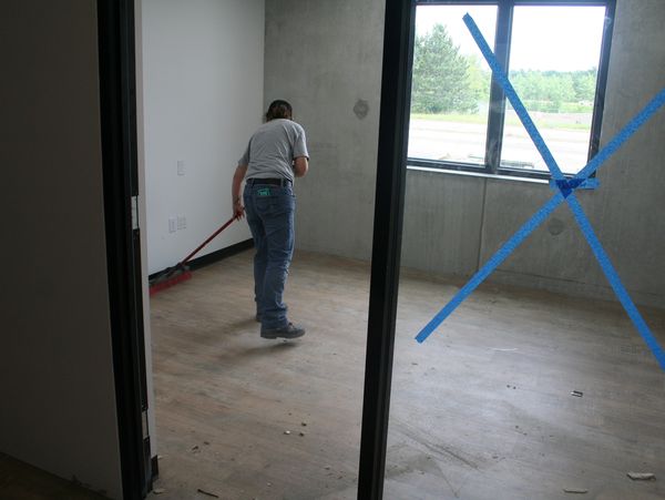 j & f facility services technician cleaning a new office building in lake hallie wisconsin