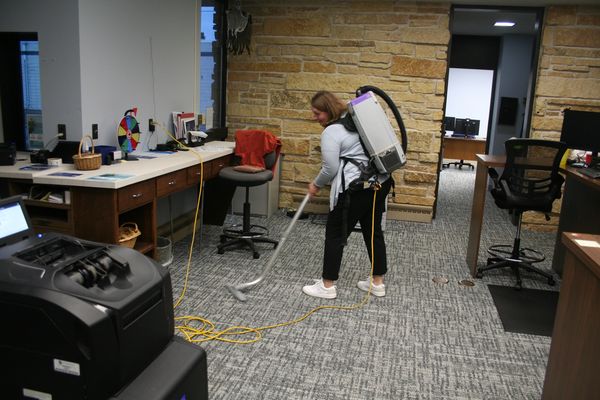 j & f facility services technician cleaning a bank in lake hallie wisconsin