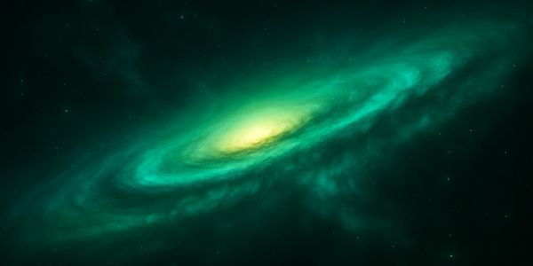 A glowing green spiral galaxy in deep space.