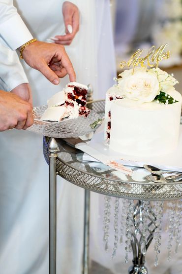 Cake cutting by Bride and Groom