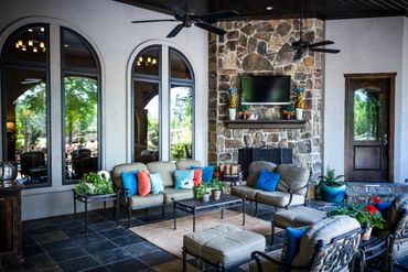 An outdoor living space with comfy chairs