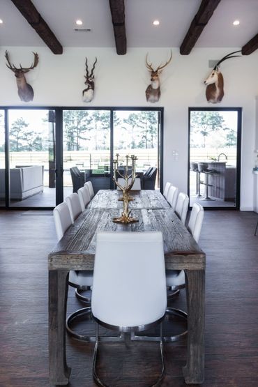 A dining area facing the glass patio doors