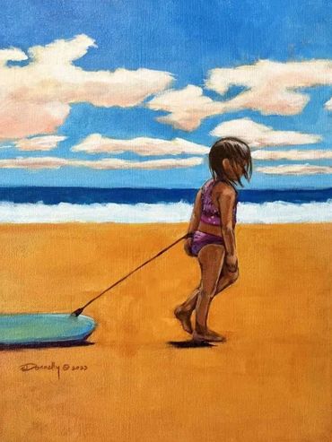 Girl on the beach with boogie board