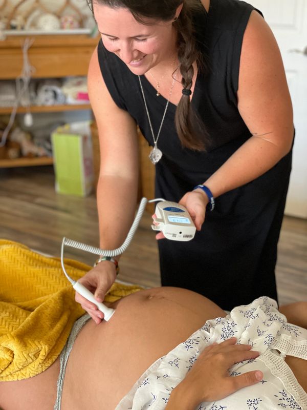 Checking Heart tones during a home visit