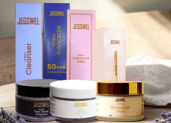 JEGSWEL herbal skincare products with lavender accents on wooden surface.