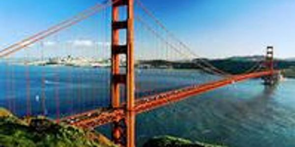 Golden Gate Bridge over the water on a clear day.