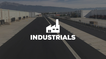 Industrial buildings with 'INDUSTRIALS' text and icon.